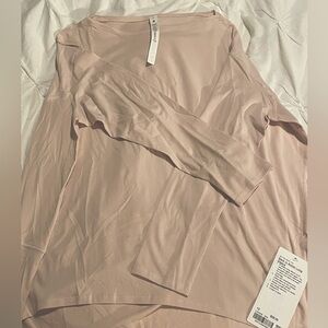 Lululemon Back in Action long sleeve, dusty pink, size 10. New With Tags